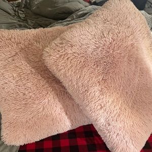 Big fluffy pink decor pillows